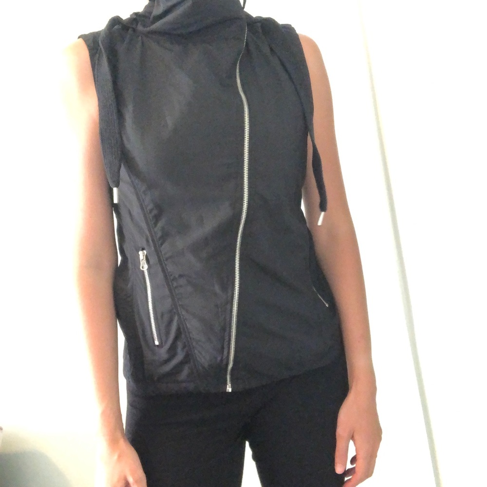 Asymmetrical vest with hood